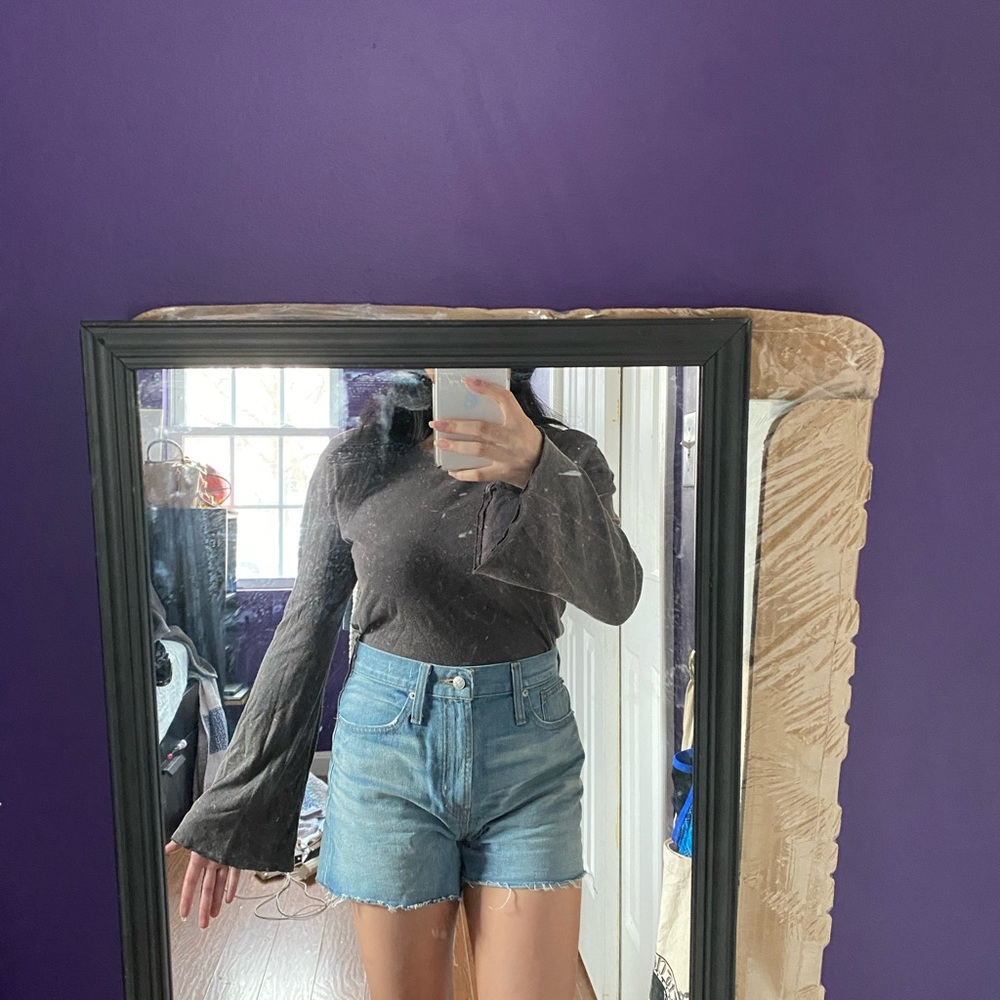 grey long sleeved top